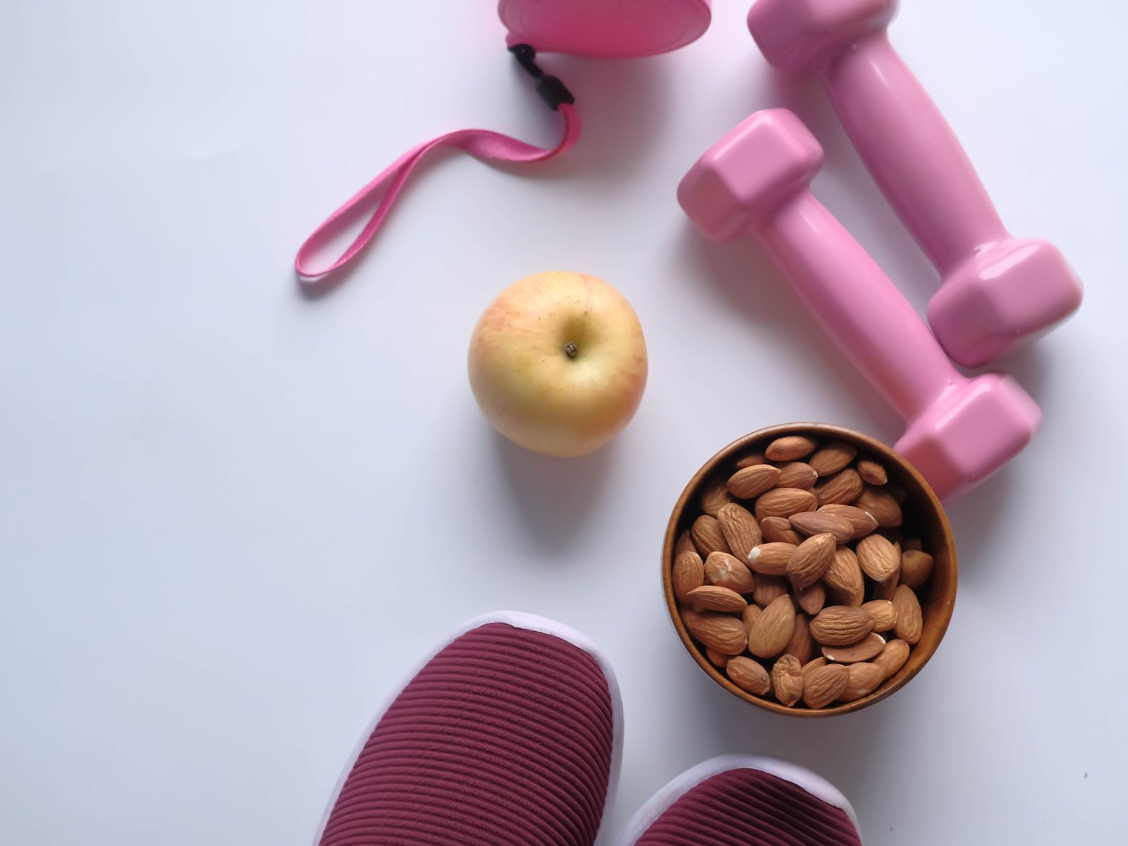 A spread of fresh healthy food alongside simple home-workout kit